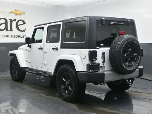 Used 2013 Jeep Wrangler Unlimited Sahara w/ Dual Top Group AWD/4WD image 35