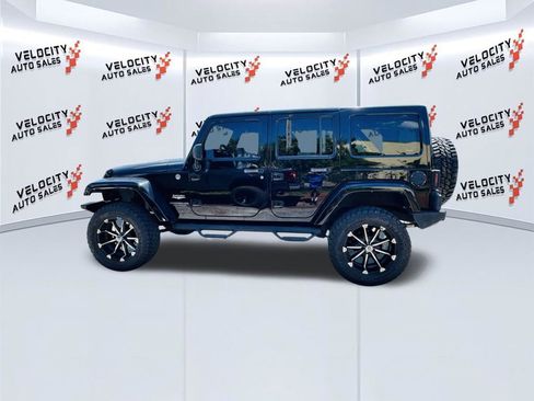 Used 2014 Jeep Wrangler Unlimited Sahara w/ Connectivity Group AWD/4WD image 6