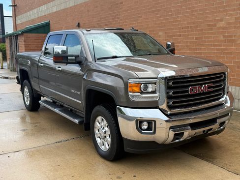 Used 2015 GMC Sierra 3500 SLT w/ Duramax Plus Package AWD/4WD image 1