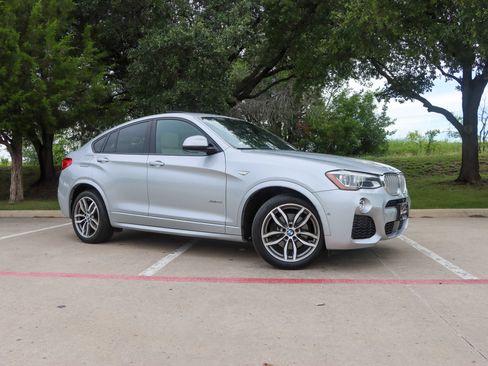 Used 2016 BMW X4 xDrive35i AWD/4WD image 1