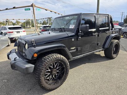 Used 2014 Jeep Wrangler Unlimited Sahara w/ Dual Top Group