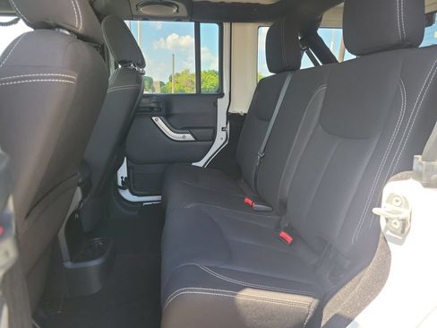 Used 2014 Jeep Wrangler Unlimited Sahara w/ Connectivity Group AWD/4WD image 11