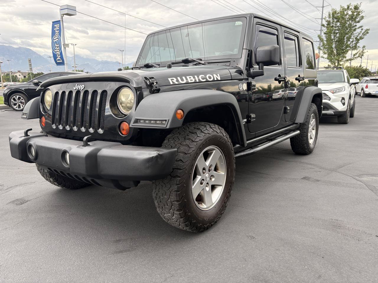 Used 2012 Jeep Wrangler Unlimited Rubicon w/ Dual Top Group AWD/4WD image 3