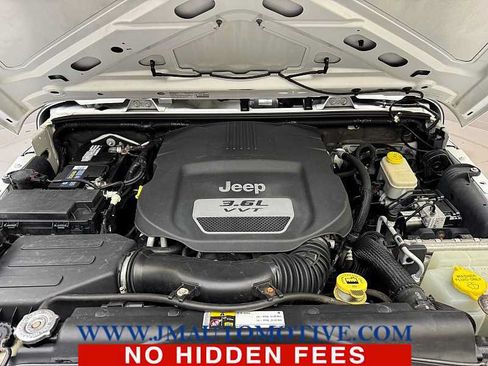 Used 2013 Jeep Wrangler Unlimited Sahara w/ Dual Top Group AWD/4WD image 10