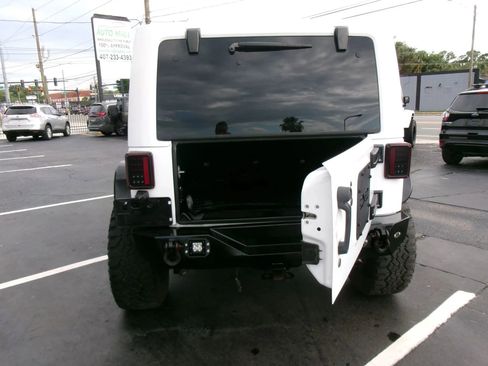 Used 2013 Jeep Wrangler Unlimited Rubicon w/ Dual Top Group AWD/4WD image 18