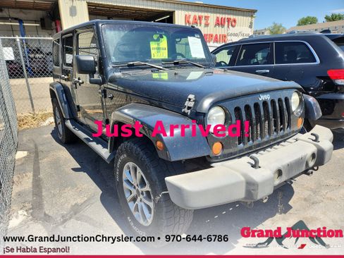 Used 2007 Jeep Wrangler Unlimited Sahara w/ Dual Top Group AWD/4WD image 1