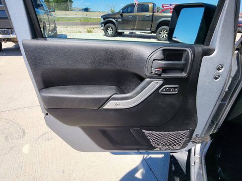 Used 2013 Jeep Wrangler Unlimited Sahara w/ Dual Top Group AWD/4WD image 11