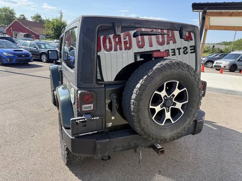 Used 2011 Jeep Wrangler Sahara w/ Dual Top Group AWD/4WD image 12
