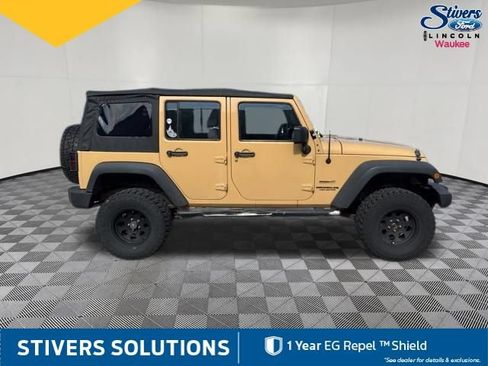 Used 2013 Jeep Wrangler Unlimited Sport w/ Mopar Black Appearance Group AWD/4WD image 5