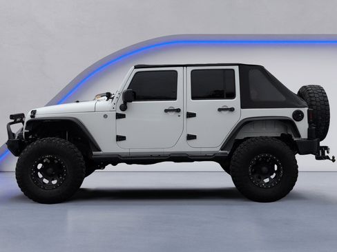 Used 2012 Jeep Wrangler Unlimited Sport image 3