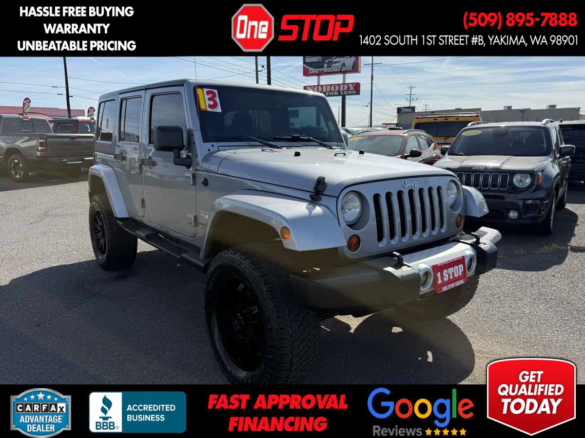 Used 2013 Jeep Wrangler Unlimited Sahara AWD/4WD image 1