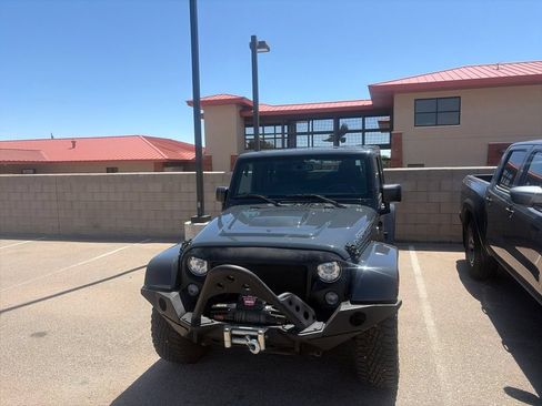 Used 2017 Jeep Wrangler Unlimited Sahara AWD/4WD image 1