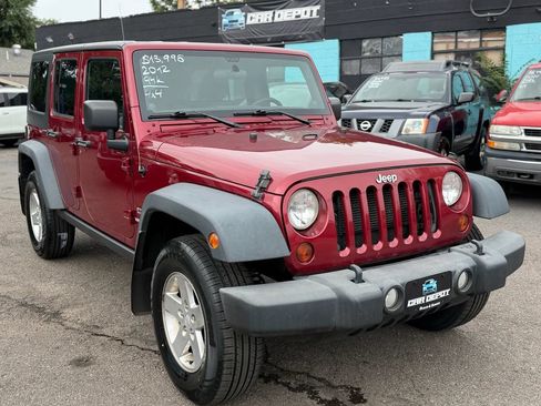 Used 2012 Jeep Wrangler Unlimited Sport AWD/4WD image 1