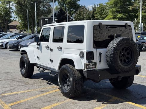 Used 2012 Jeep Wrangler Unlimited Sahara w/ Dual Top Group AWD/4WD image 8