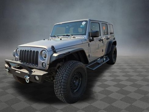 Used 2014 Jeep Wrangler Unlimited Sahara w/ Max Tow Package AWD/4WD image 4