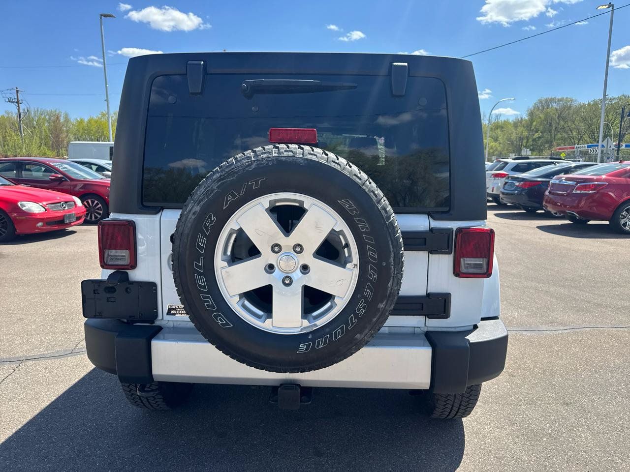 Used 2012 Jeep Wrangler Unlimited Sahara w/ Dual Top Group AWD/4WD image 6