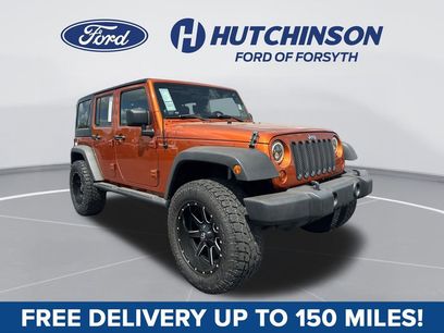 Used 2011 Jeep Wrangler Unlimited Sport