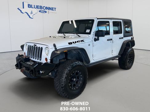 Used 2012 Jeep Wrangler Unlimited Sport AWD/4WD image 1
