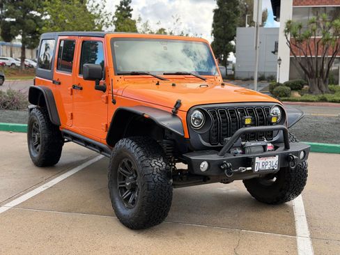 Used 2013 Jeep Wrangler Unlimited Sport image 1