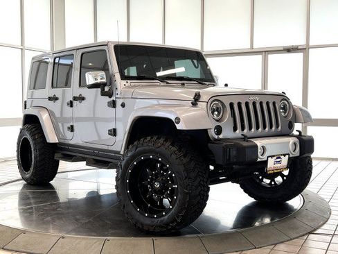 Used 2015 Jeep Wrangler Unlimited Sahara w/ Dual Top Group AWD/4WD image 1