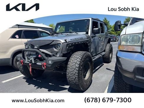 Used 2014 Jeep Wrangler Unlimited Rubicon w/ Connectivity Group AWD/4WD image 1