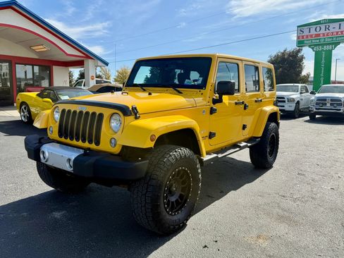 Used 2015 Jeep Wrangler Unlimited Sahara w/ Connectivity Group AWD/4WD image 1