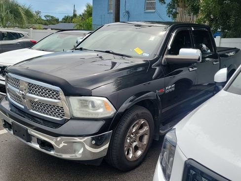 Used 2015 RAM 1500 Laramie AWD/4WD image 1