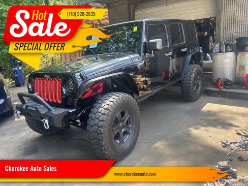 Used 2013 Jeep Wrangler Unlimited Sahara w/ Connectivity Group AWD/4WD image 1