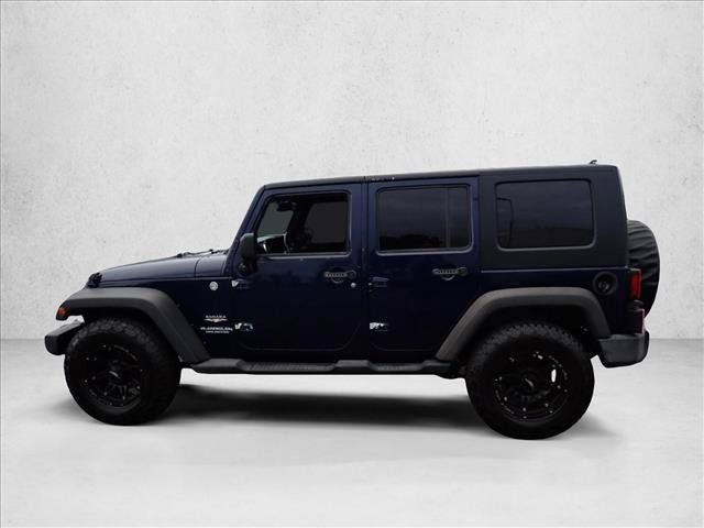 Used 2013 Jeep Wrangler Unlimited Sahara w/ Connectivity Group AWD/4WD image 2