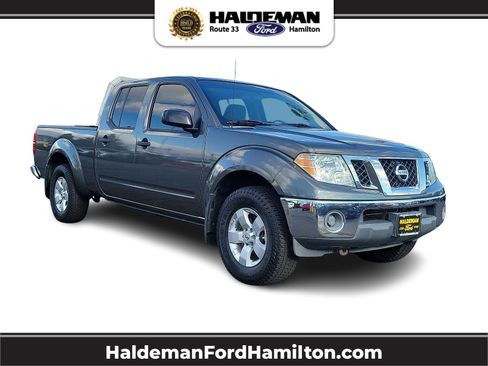 Used 2009 Nissan Frontier SE w/ SE Value Truck Pkg AWD/4WD image 1