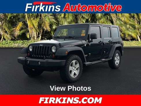 Used 2012 Jeep Wrangler Unlimited Sport AWD/4WD image 1