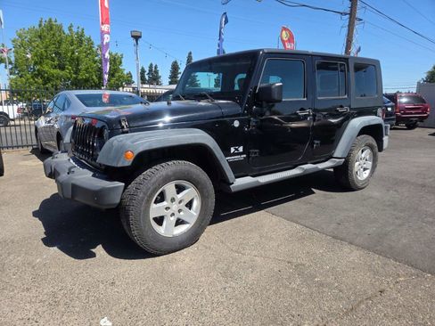 Used 2009 Jeep Wrangler Unlimited X image 1