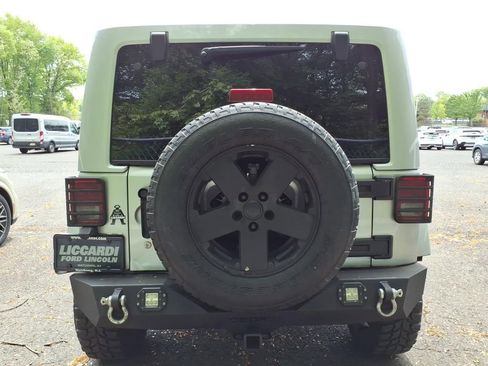 Used 2012 Jeep Wrangler Unlimited Sahara w/ Dual Top Group AWD/4WD image 5