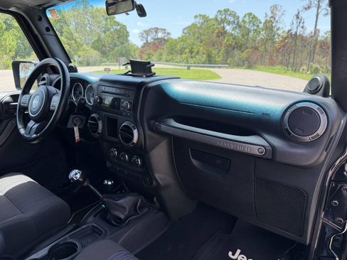 Used 2012 Jeep Wrangler Unlimited Sport w/ Connectivity Group AWD/4WD image 26