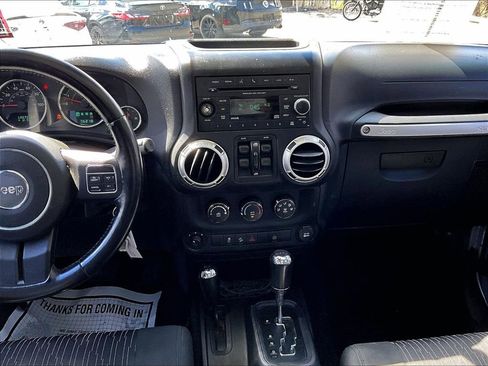 Used 2012 Jeep Wrangler Unlimited Rubicon w/ Dual Top Group AWD/4WD image 26