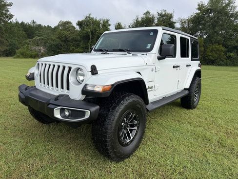 Used 2021 Jeep Wrangler Unlimited Sahara AWD/4WD image 1