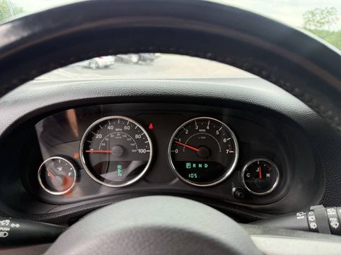 Used 2013 Jeep Wrangler Unlimited Sahara w/ Dual Top Group AWD/4WD image 12