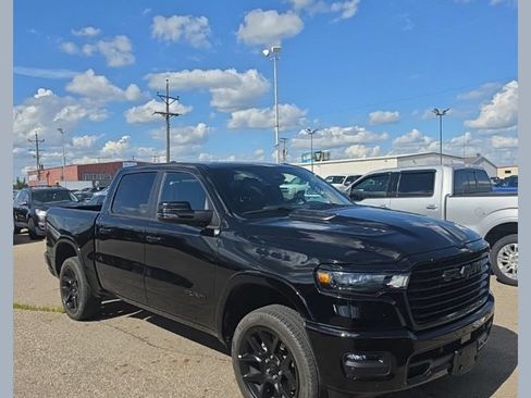 Used 2025 RAM 1500 Laramie w/ Night Edition AWD/4WD image 1