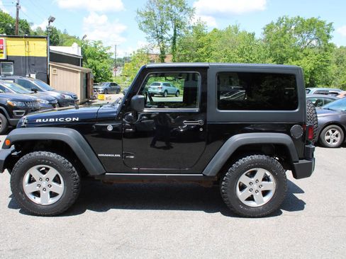 Used 2011 Jeep Wrangler Rubicon w/ Dual Top Group AWD/4WD image 11