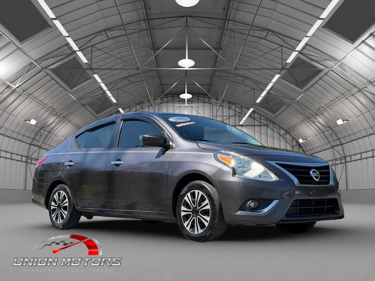 Used 2015 Nissan Versa SV FWD image 1