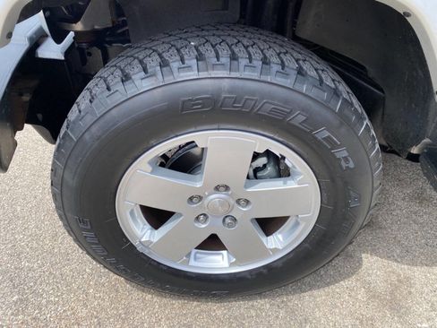 Used 2012 Jeep Wrangler Unlimited Sahara w/ Dual Top Group AWD/4WD image 9