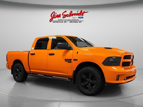 Used 2019 RAM 1500 Express w/ Ignition Orange Sport Package AWD/4WD image 1