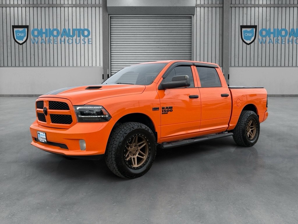 Used 2019 RAM 1500 Express w/ Ignition Orange Sport Package AWD/4WD image 1