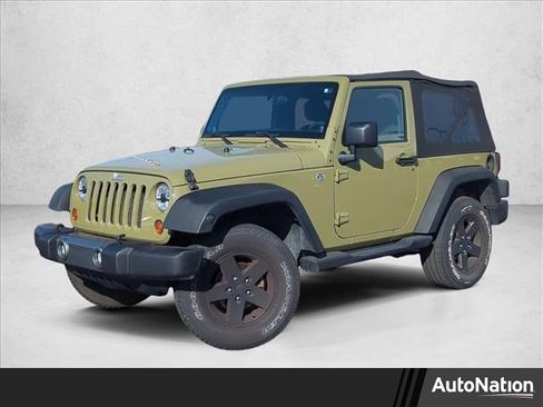 Used 2013 Jeep Wrangler Sport image 1