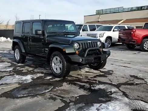 Used 2010 Jeep Wrangler Unlimited Sahara w/ Trailer Tow Group AWD/4WD image 2