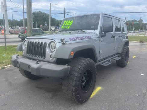 Used 2014 Jeep Wrangler Unlimited Rubicon w/ Dual Top Group AWD/4WD image 2
