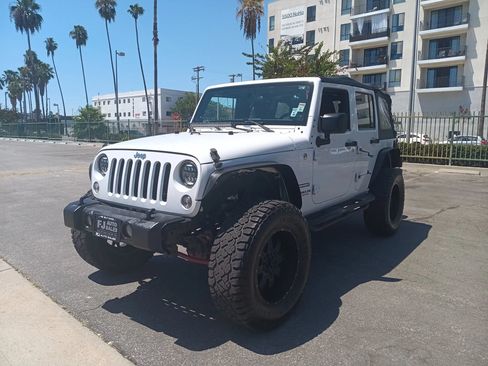 Used 2014 Jeep Wrangler Unlimited Sport AWD/4WD image 3