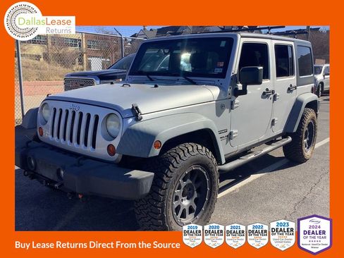 Used 2012 Jeep Wrangler Unlimited Sport image 1