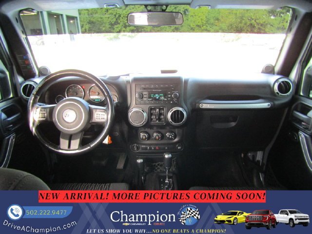 Used 2012 Jeep Wrangler Unlimited Sahara w/ Dual Top Group AWD/4WD image 9