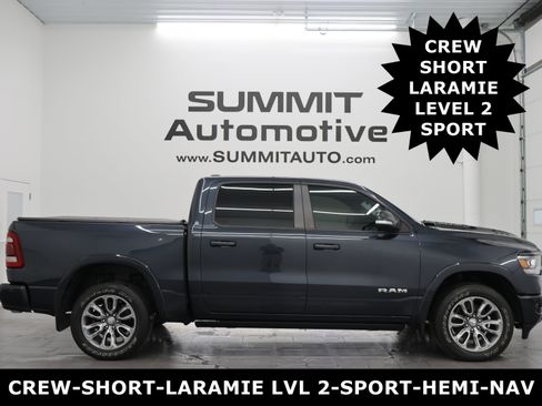 Used 2019 RAM 1500 Laramie AWD/4WD image 1